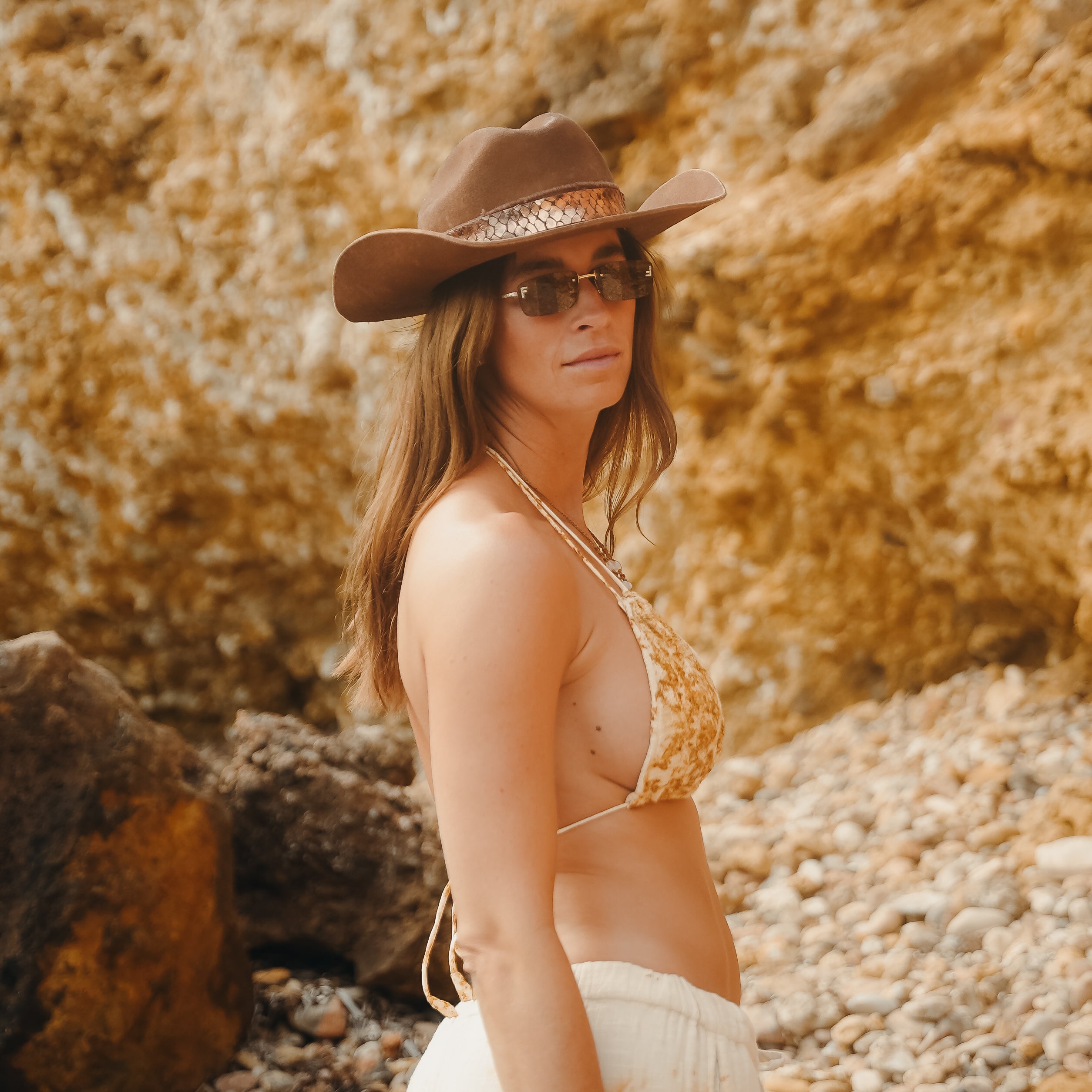Metallic bronze cow leather band detail on cacao Merino wool hat — Satori Collection Tanit