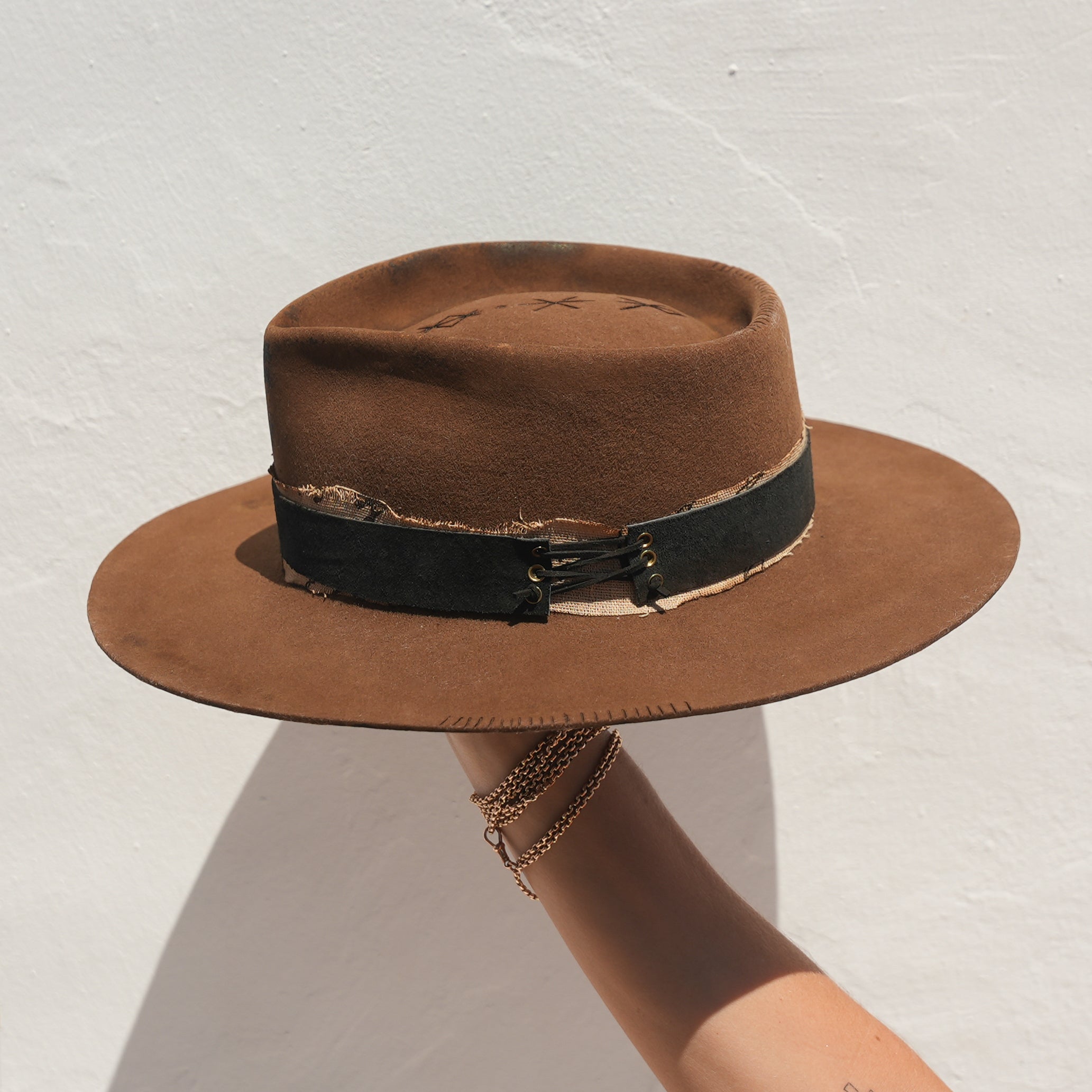 Side profile of khaki pinched fedora showing 8cm brim and crown shape — Satori Collection Valhalla