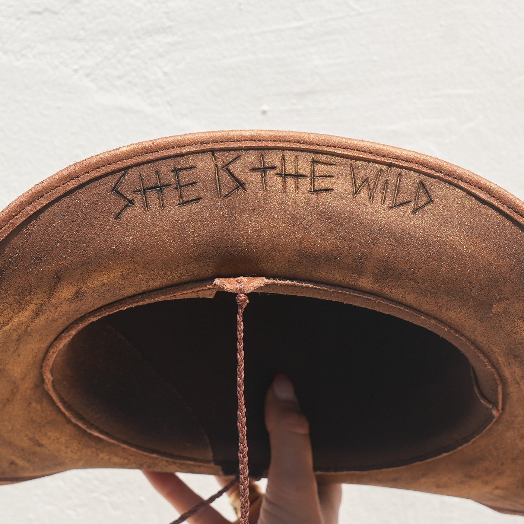 Leather-engraved brim on handcrafted Satori crystal hat — Wild Heart, made in England
