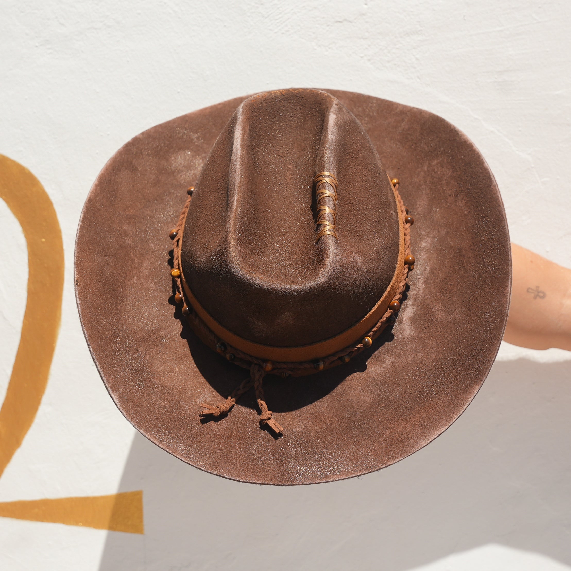 Suede tan hat belt detail on fire-distressed Merino wool cowboy hat — Satori Collection Warrior