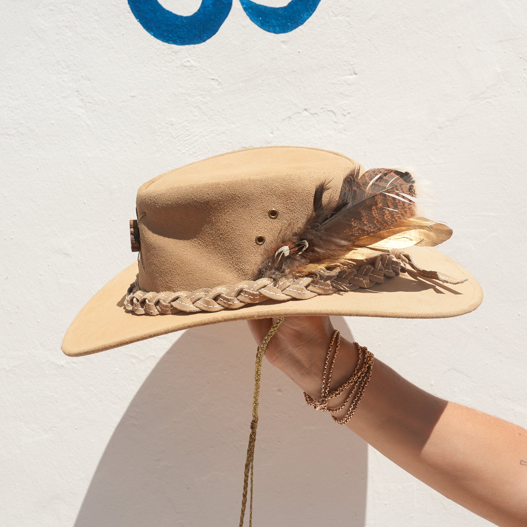 Beige Merino wool felt bohemian hat with Tigers Eye crystal and gold feather detail — Satori Collection Aya