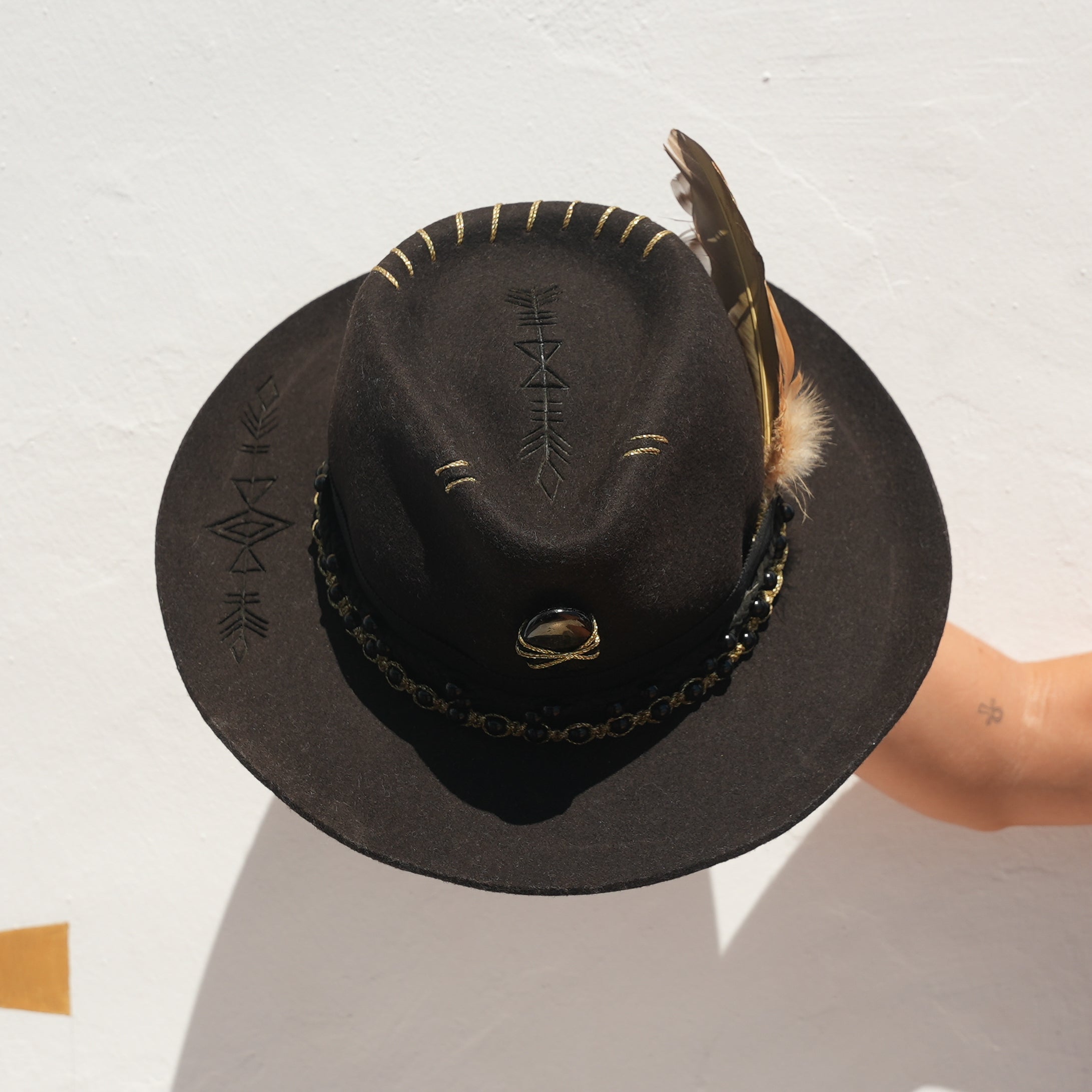 Dark crystal cowboy hat with hand drawn marking detail — Satori Collection Jaguar Rising