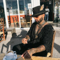 Jaguar Rising — black Obsidian crystal fedora hat with gold feathers, handmade in England by Satori Collection