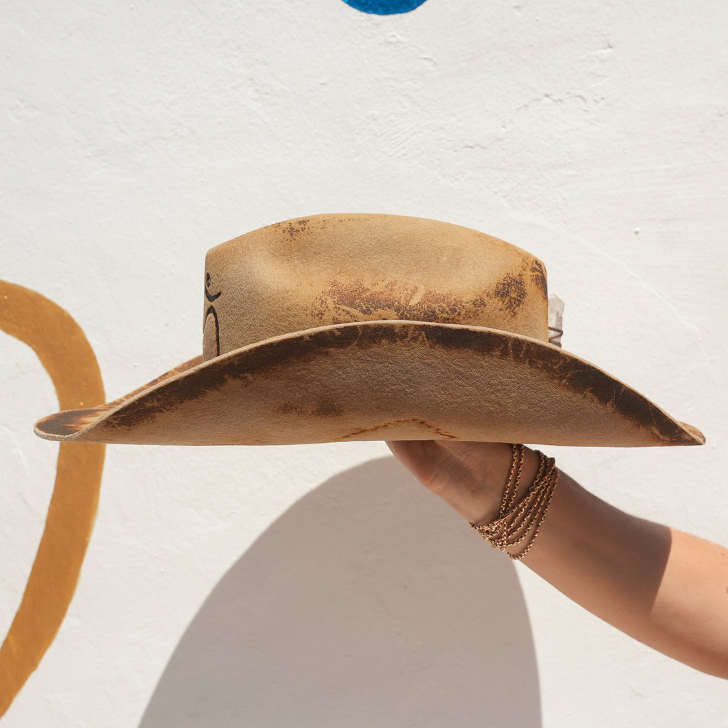 Fire-distressed beige cowboy hat with silk lining and leather sweatband detail — Satori Collection